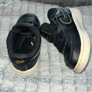 Unisex size 7, black Air Force ones